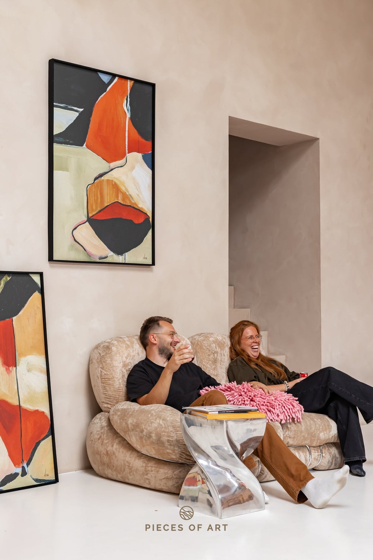 Acoustic wall decor, in a hallway, that reduces reverberation